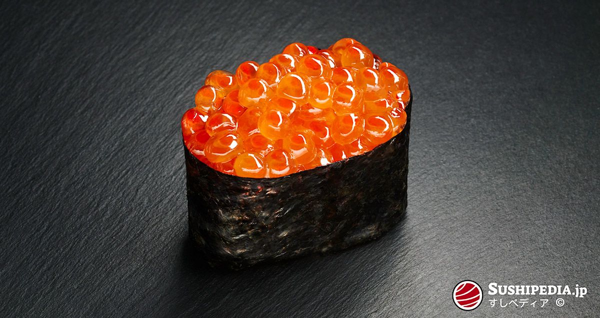 Photo of a freshly prepared sushi (gunkan maki sushi) with the ingredient that is called Ikura in Japanese.