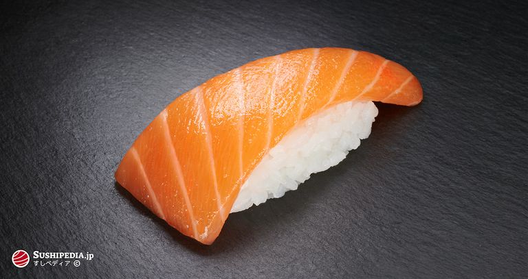 Photo of a freshly prepared sushi (nigiri sushi) with the ingredient that is called Sake or Samon in Japanese.