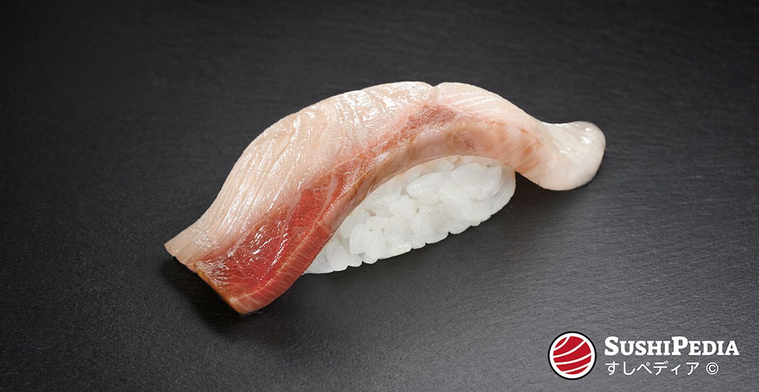 Photo of a freshly prepared sushi (nigiri sushi) with the ingredient that is called Hamachi in Japanese.