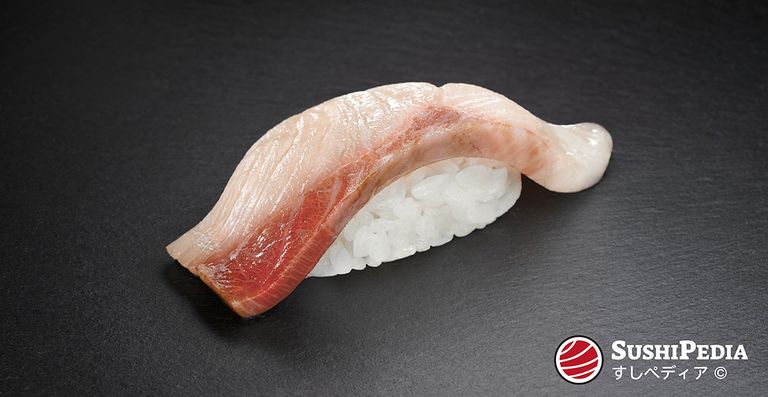 Photo of a freshly prepared sushi (nigiri sushi) with the ingredient that is called Hamachi in Japanese.