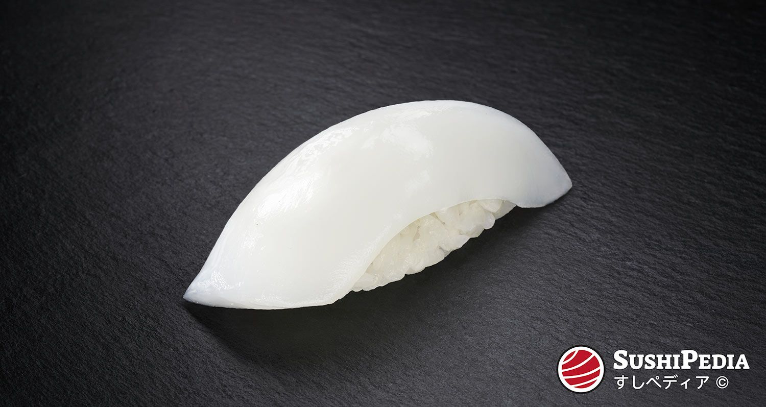 Photo of a freshly prepared sushi (nigiri sushi) with the ingredient that is called Ika in Japanese.