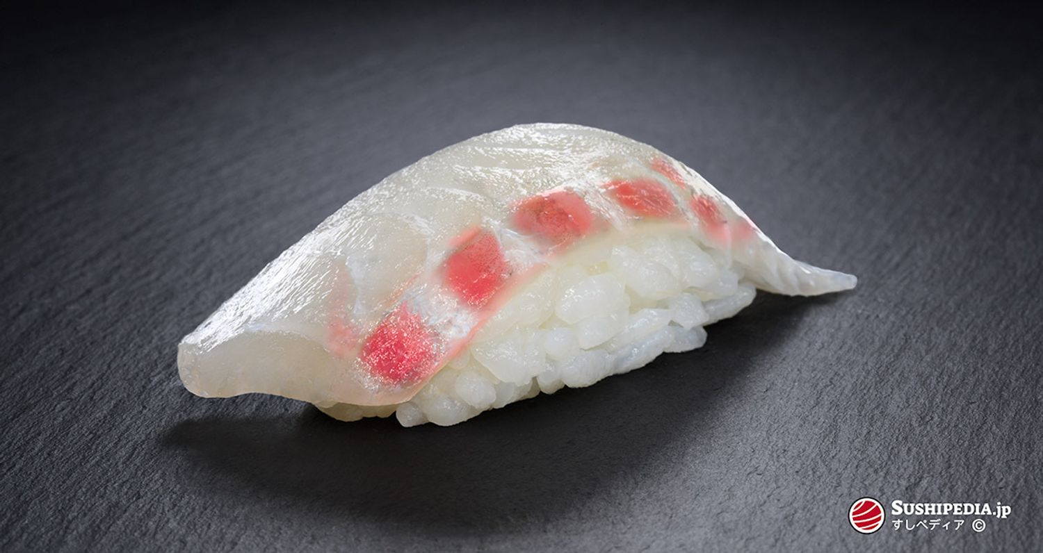 Photo of a freshly prepared sushi (nigiri sushi) with the ingredient that is called Tai in Japanese.
